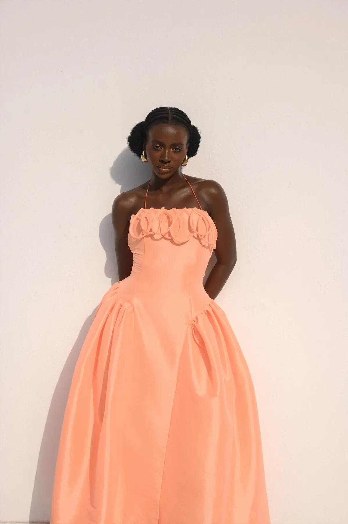 Desiree Iyama Meraki Midi Dress with Features a fitted bodice, elastic halterneck, exaggerated ovals at chest, back invisible zip