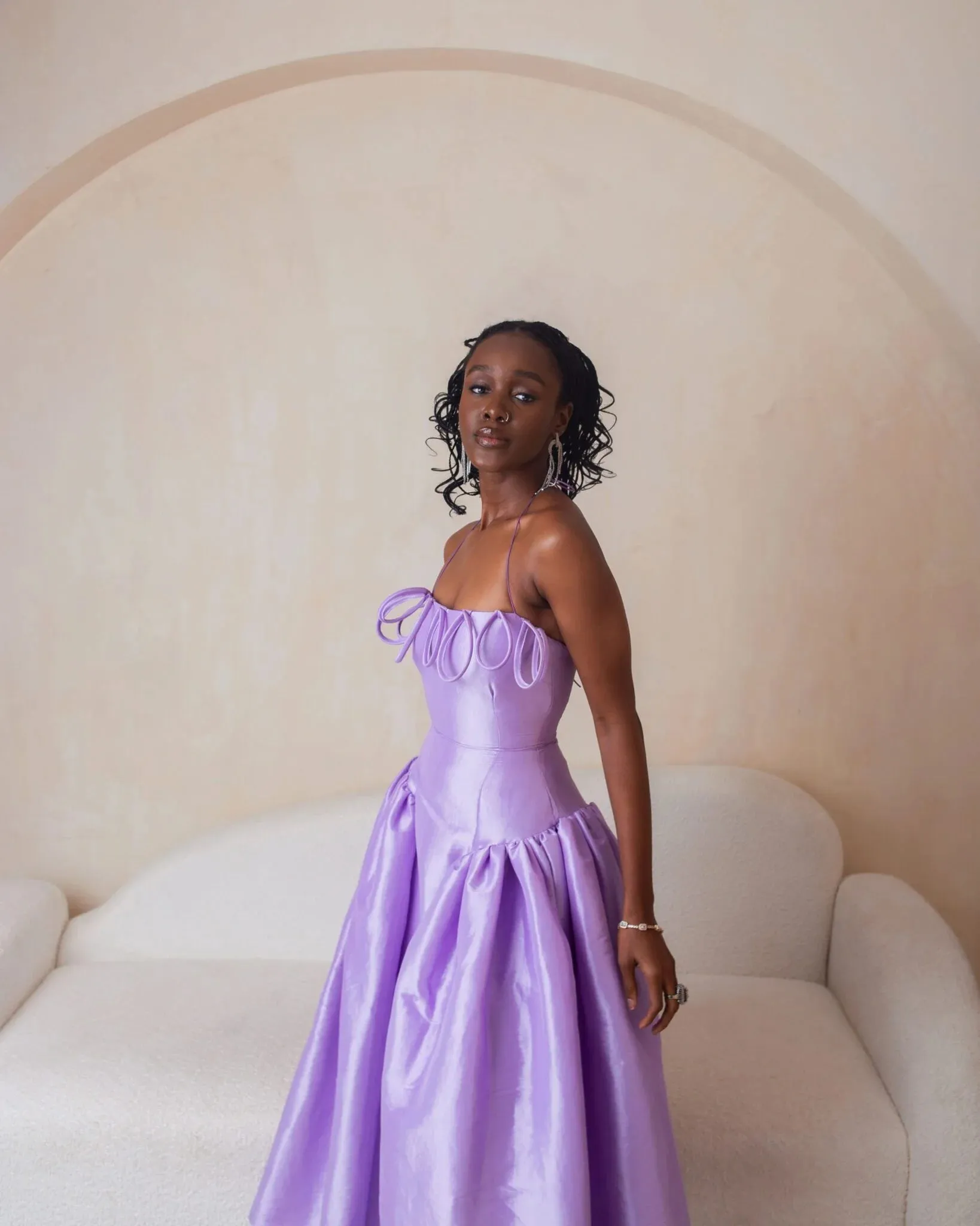 Desiree Iyama Meraki Midi Dress with Features a fitted bodice, elastic halterneck, exaggerated ovals at chest, back invisible zip