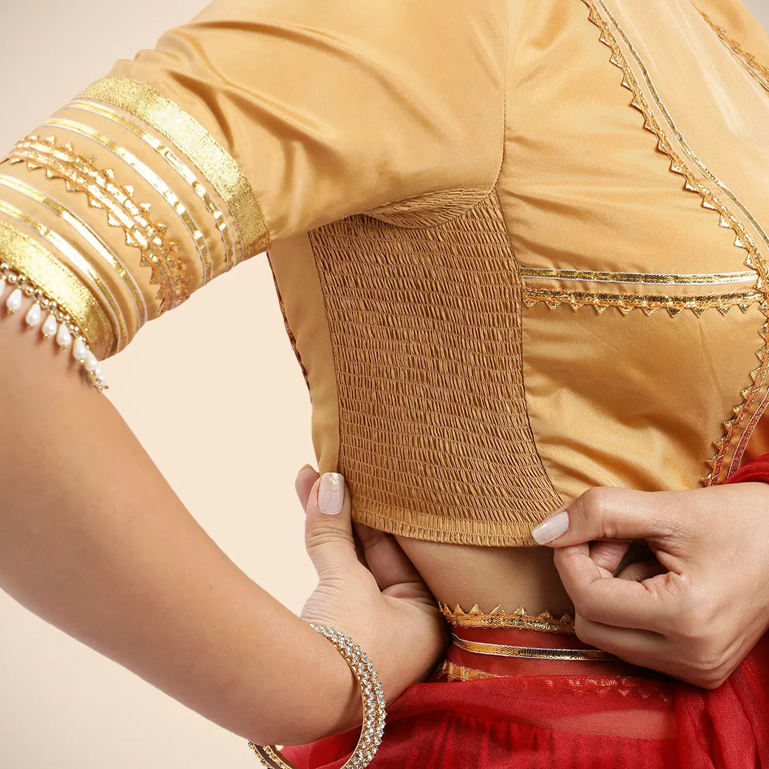 Farheen x Tyohaar | Gold Embellished Elbow Sleeves FlexiFit™ Saree Blouse with Zero Neck with Back Cut-Out and Golden Gota Embellishment