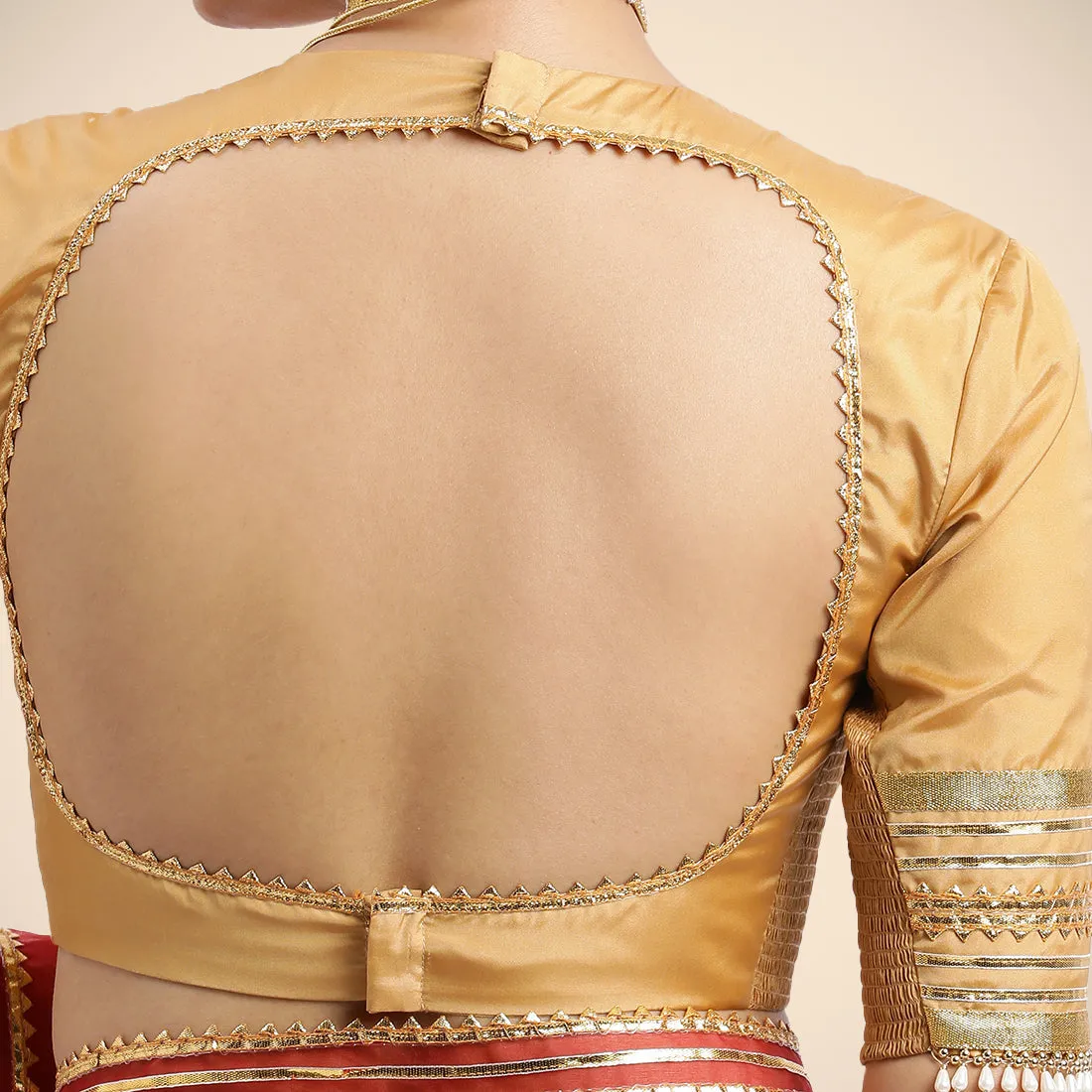 Farheen x Tyohaar | Gold Embellished Elbow Sleeves FlexiFit™ Saree Blouse with Zero Neck with Back Cut-Out and Golden Gota Embellishment